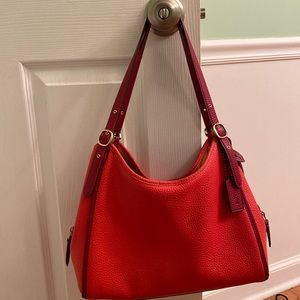Coach Lori shoulder bag in red. Soft pebble leather. Inside snap pocket.